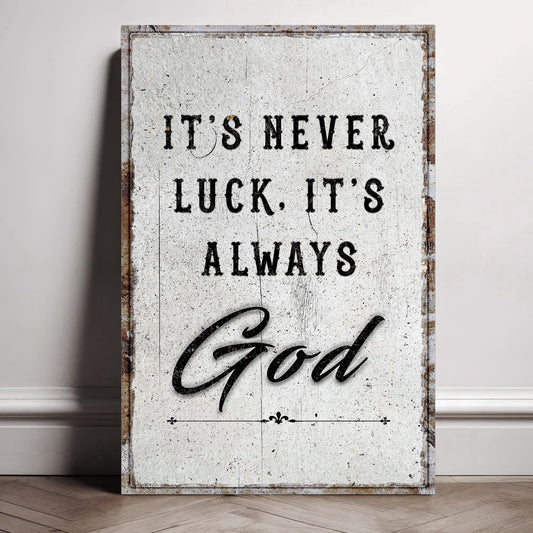 Framed wall art canvas with "It's never luck, it's always God" quote and rustic border