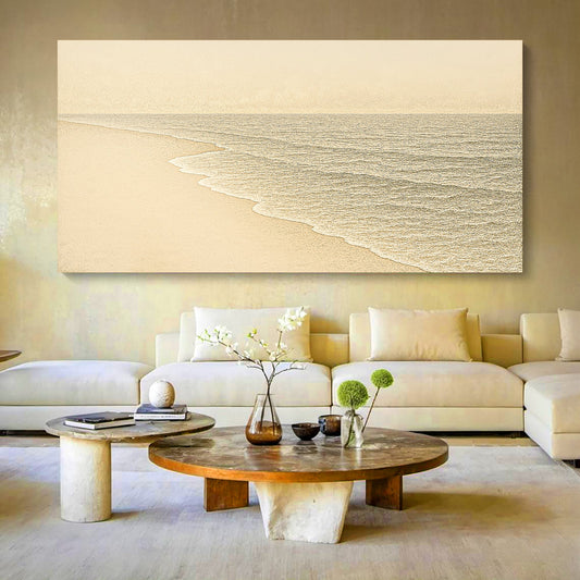 Coastal wall art canvas print with pale sand, foamy shoreline, and calm gray-blue sea