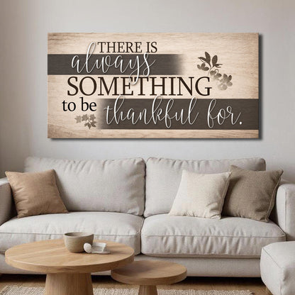 Framed wall sign with beige woodgrain, gray band, and “There is always something to be thankful for.”