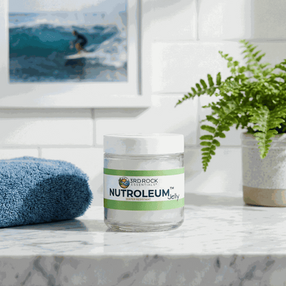 Skin balm jar with white lid and green label on countertop