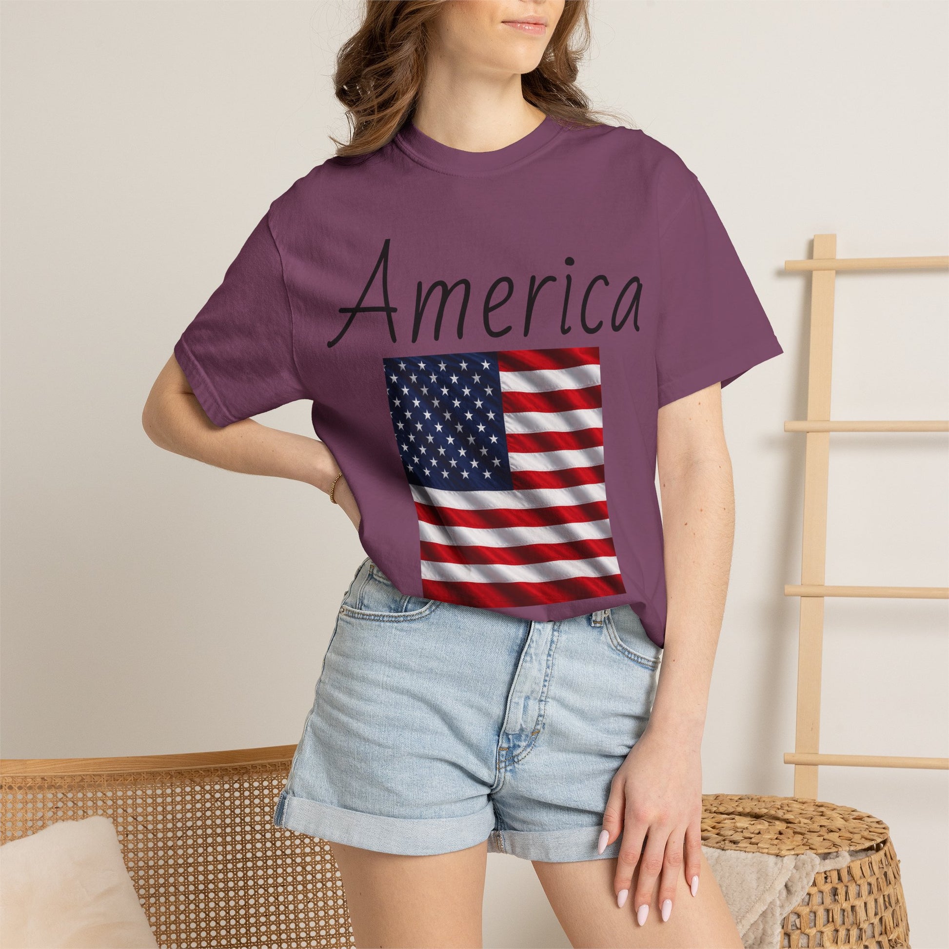 Purple unisex T-shirt with 'America' script and US flag graphic on front, short sleeves