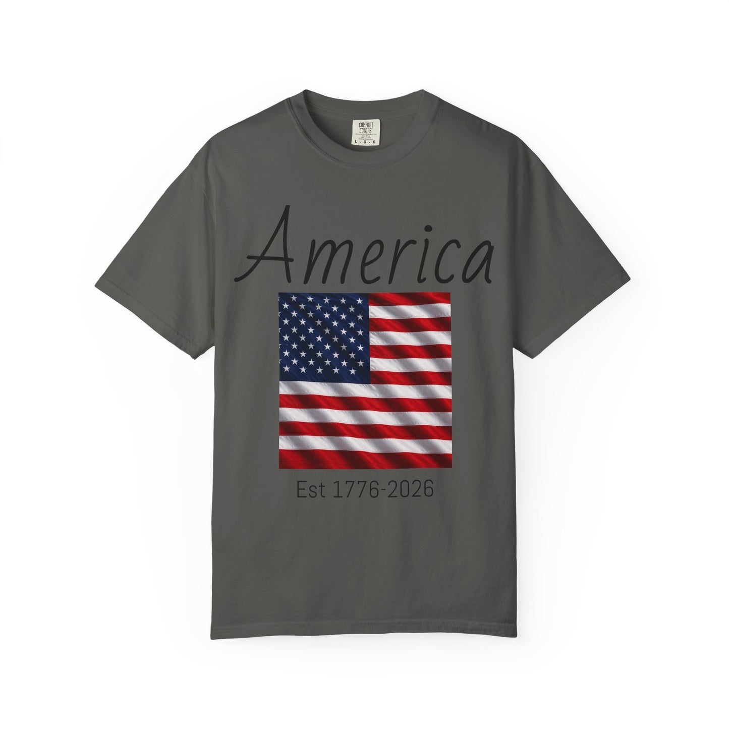 Dark gray unisex t-shirt with “America” script, US flag graphic, and “Est 1776-2026”