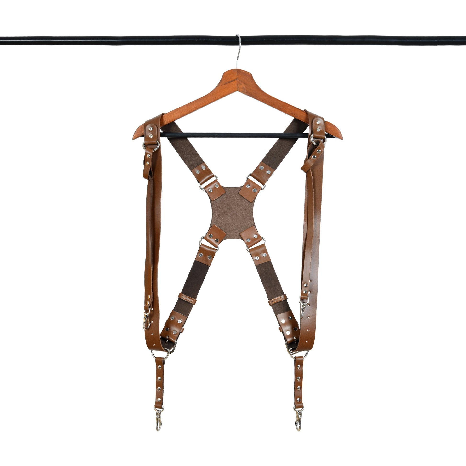 Brown leather double camera harness with adjustable shoulder straps and silver studs