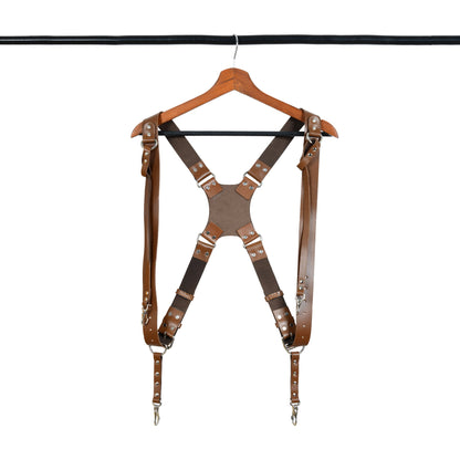 Brown leather double camera harness with adjustable shoulder straps and silver studs