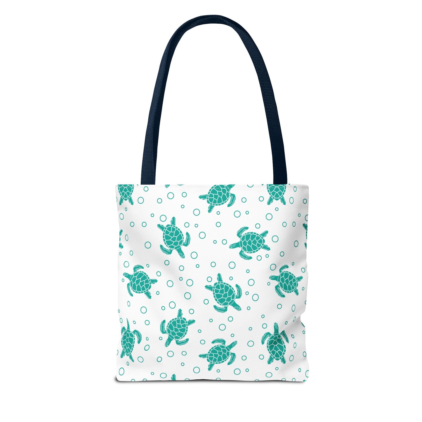 Tote bag with repeating teal sea turtle pattern and navy carrying handles