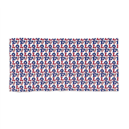 Rectangular beach towel with repeating LOL icons in red, white, and blue pattern