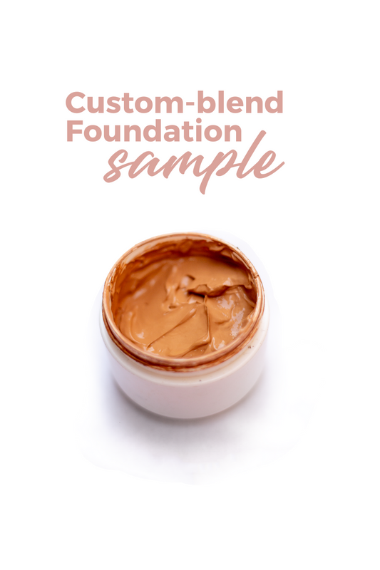 Foundation sample jar with tan cream texture