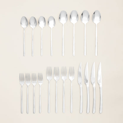 Silver flatware set with forks and spoons arranged in two rows