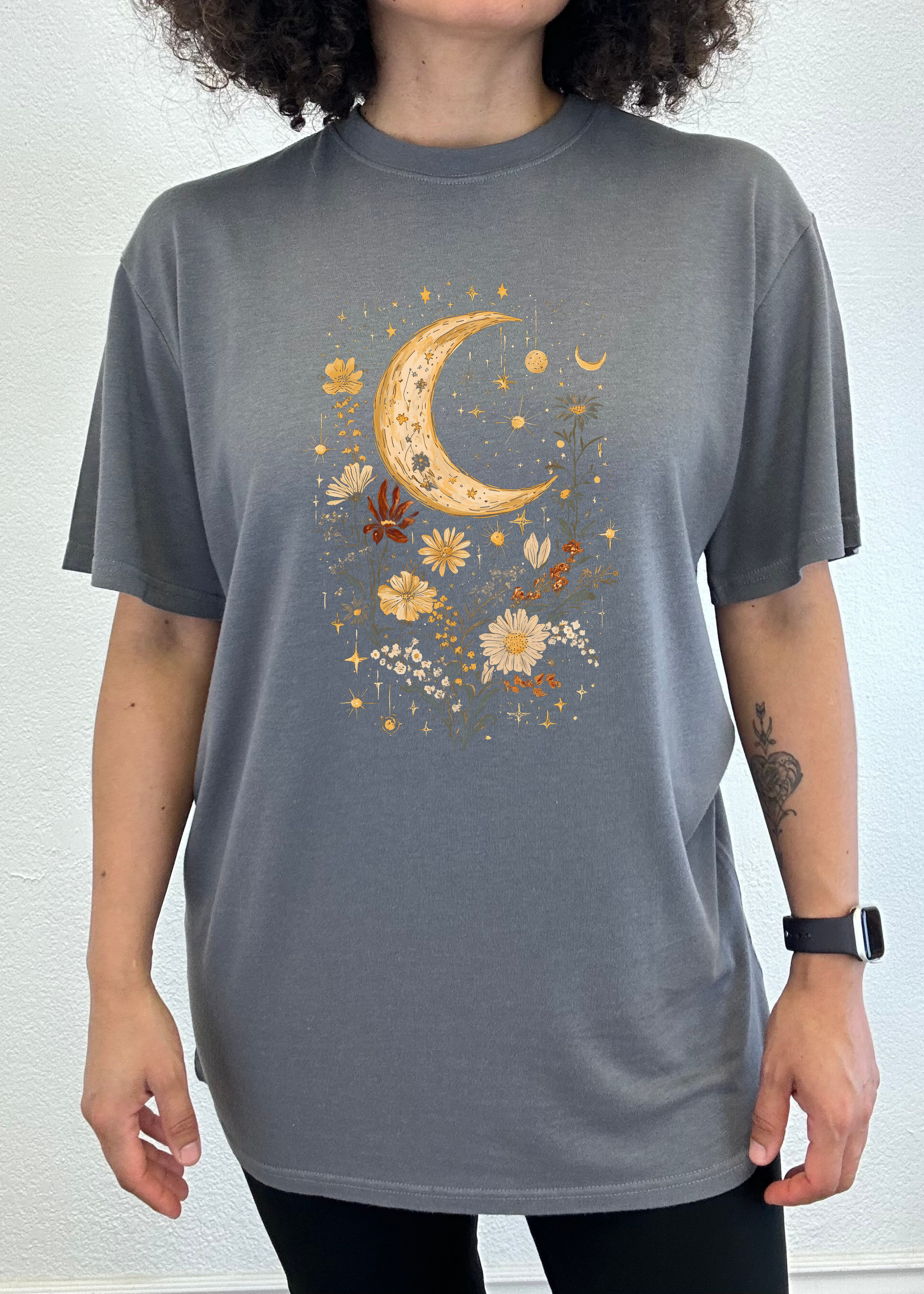 Charcoal gray unisex T-shirt with crescent moon and golden floral bouquet graphic