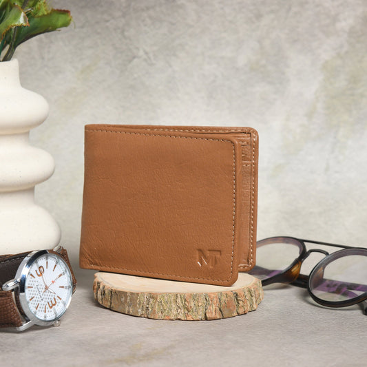Kairo slim bi-fold wallet in tan leather with stitched edges and embossed MT logo.