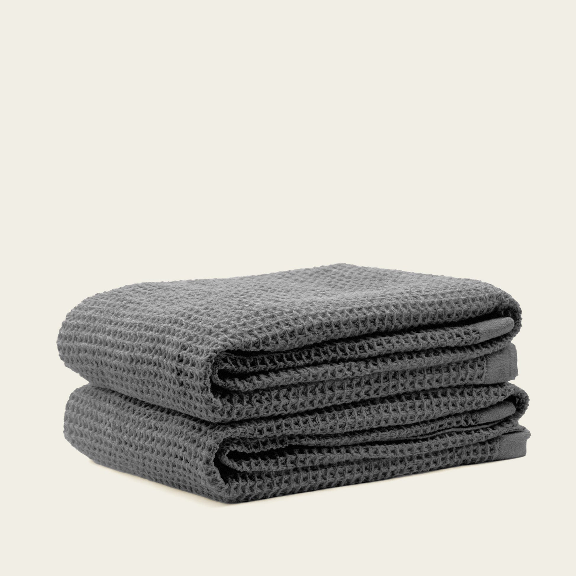 Australian cotton waffle towels in charcoal, folded stack