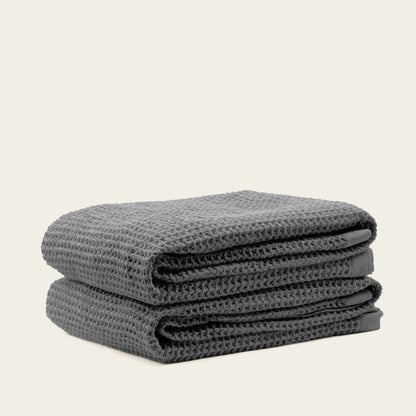 Australian cotton waffle towels in charcoal, folded stack