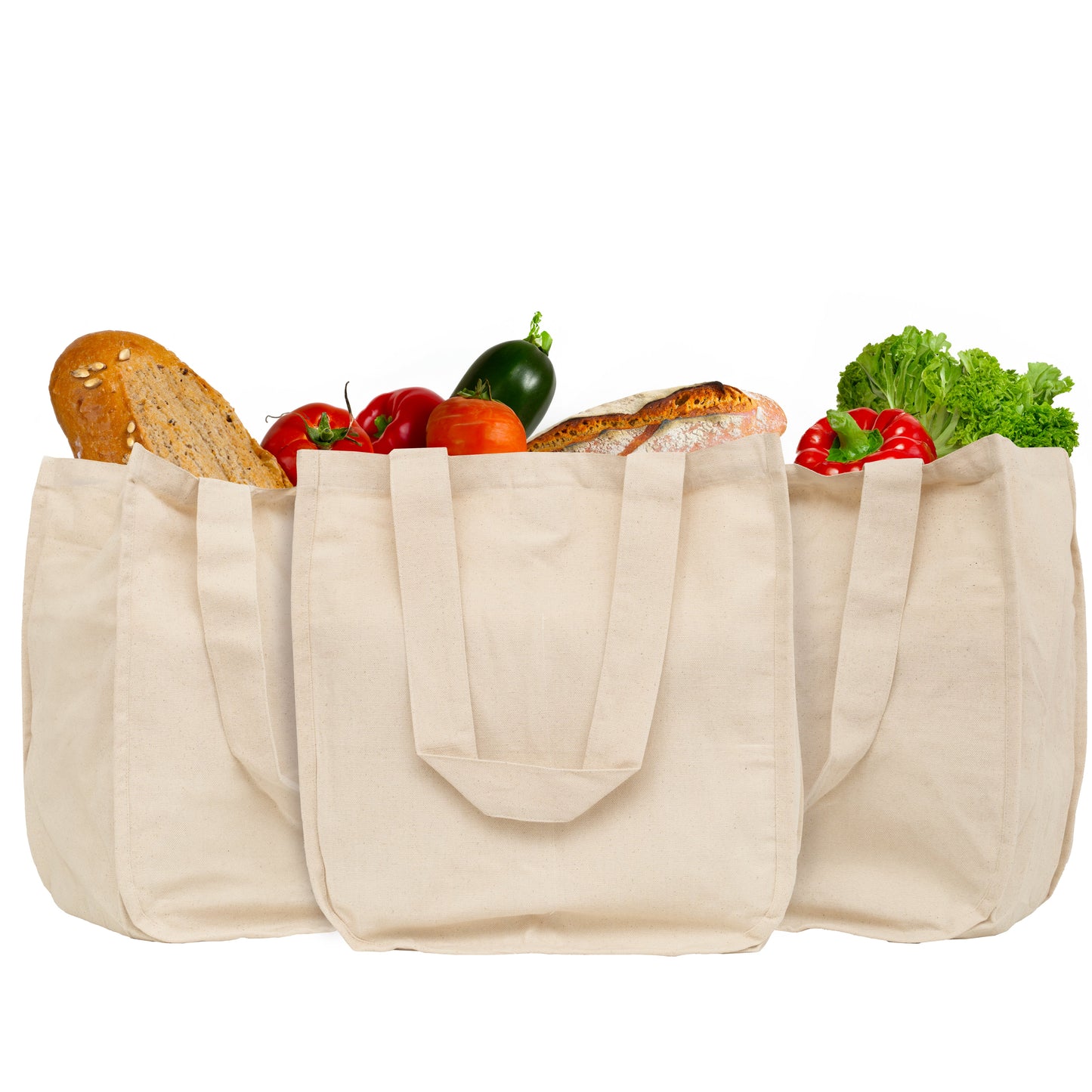Canvas grocery tote bags, beige with side pockets holding bread and vegetables