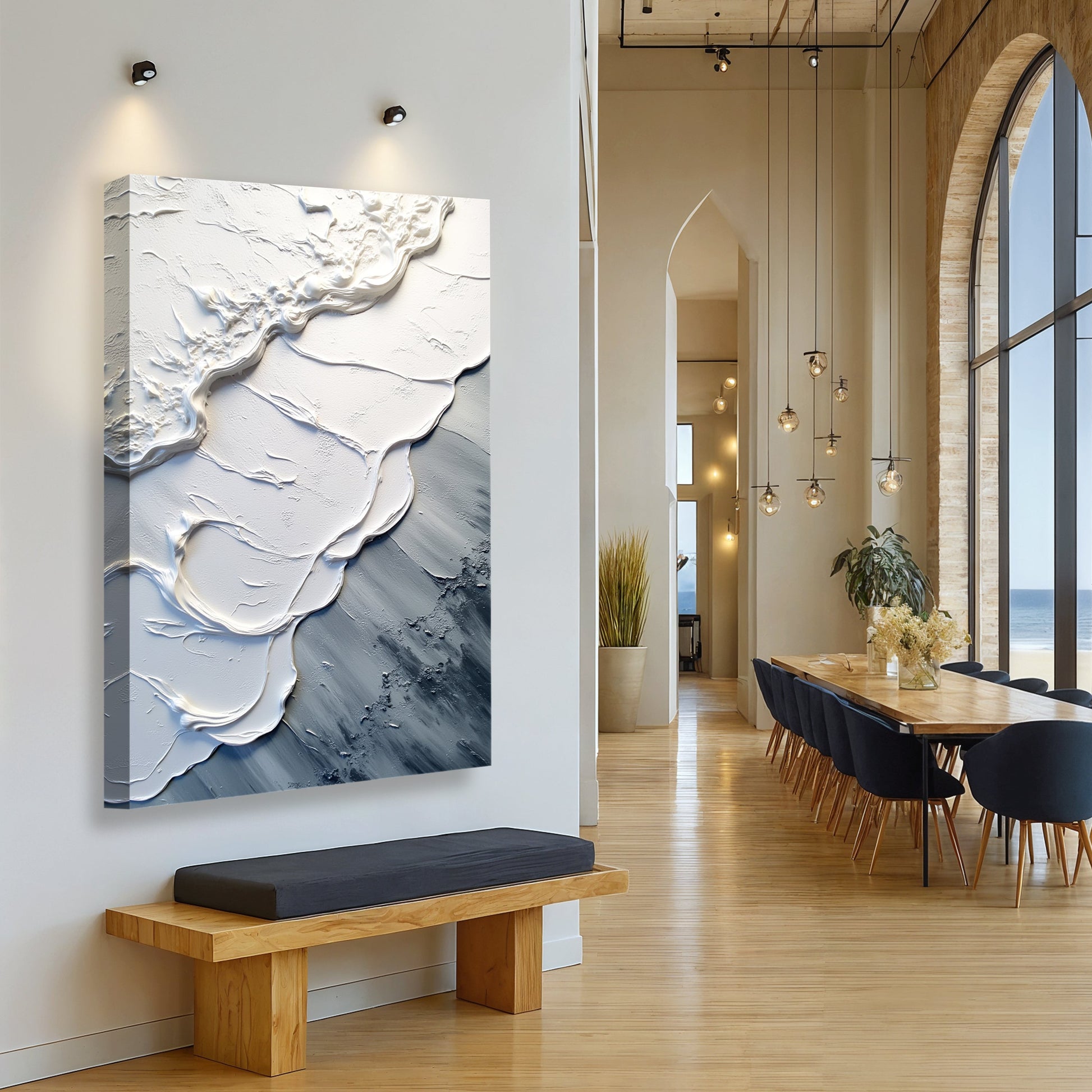 Abstract wave wall art with white relief wave swirls on blue-gray textured canvas