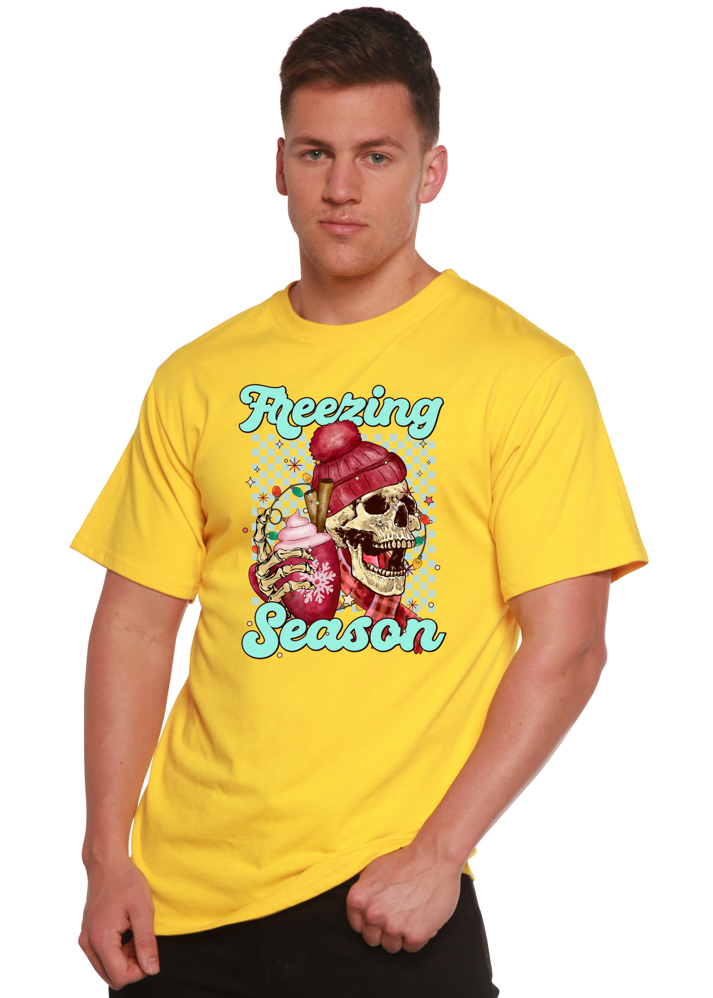 Yellow short sleeve T-shirt with “Freezing Season” skull graphic in center.