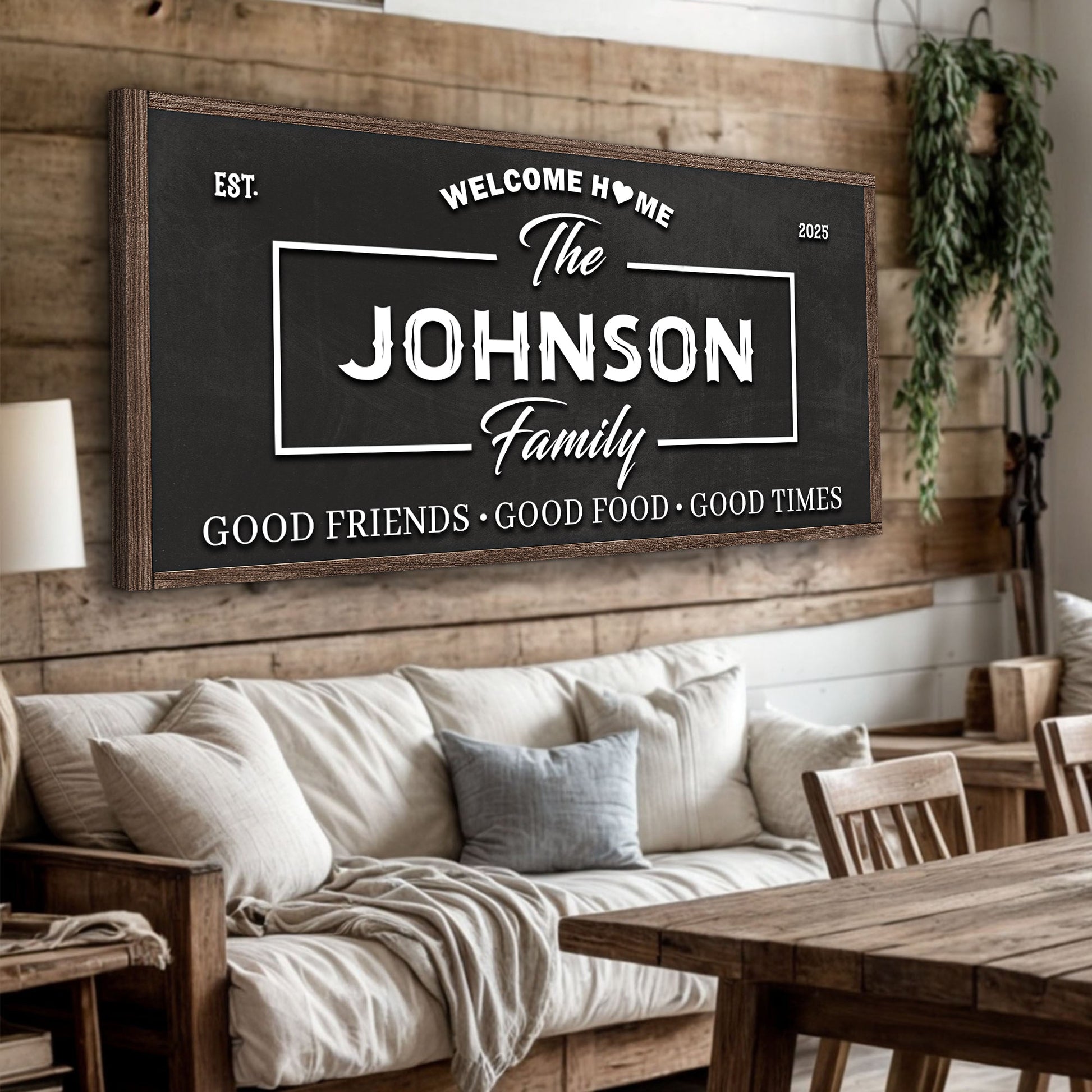 Hanging wall sign in a dark frame with “Welcome Home” and “The Johnson Family” text