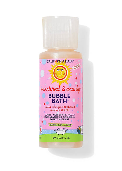 Bubble bath bottle with clear cap, pink label and green bottom band