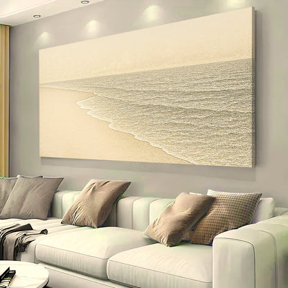 Coastal wall art canvas featuring a sandy beach edge with textured gray ocean