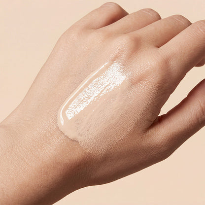 Zephoco color-changing sunscreen foundation swatch on hand, light cream glossy finish