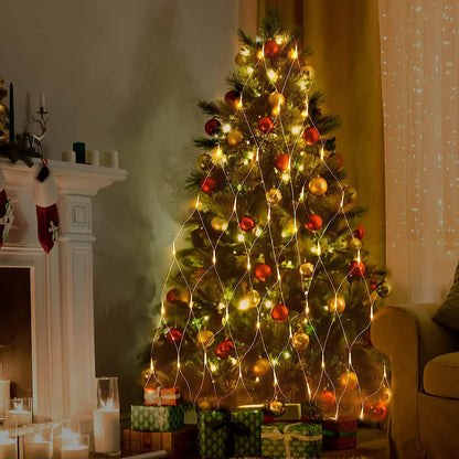 Solar fairy lights netting with warm white glow around a Christmas tree