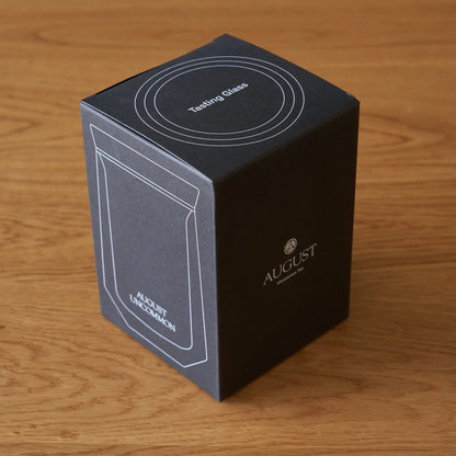 Black AUGUST UNCOMMON tasting glass gift box with top label and logo