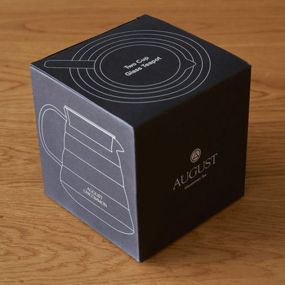 Two Cup Glass Teapot gift box with August Uncommon branding and icon.