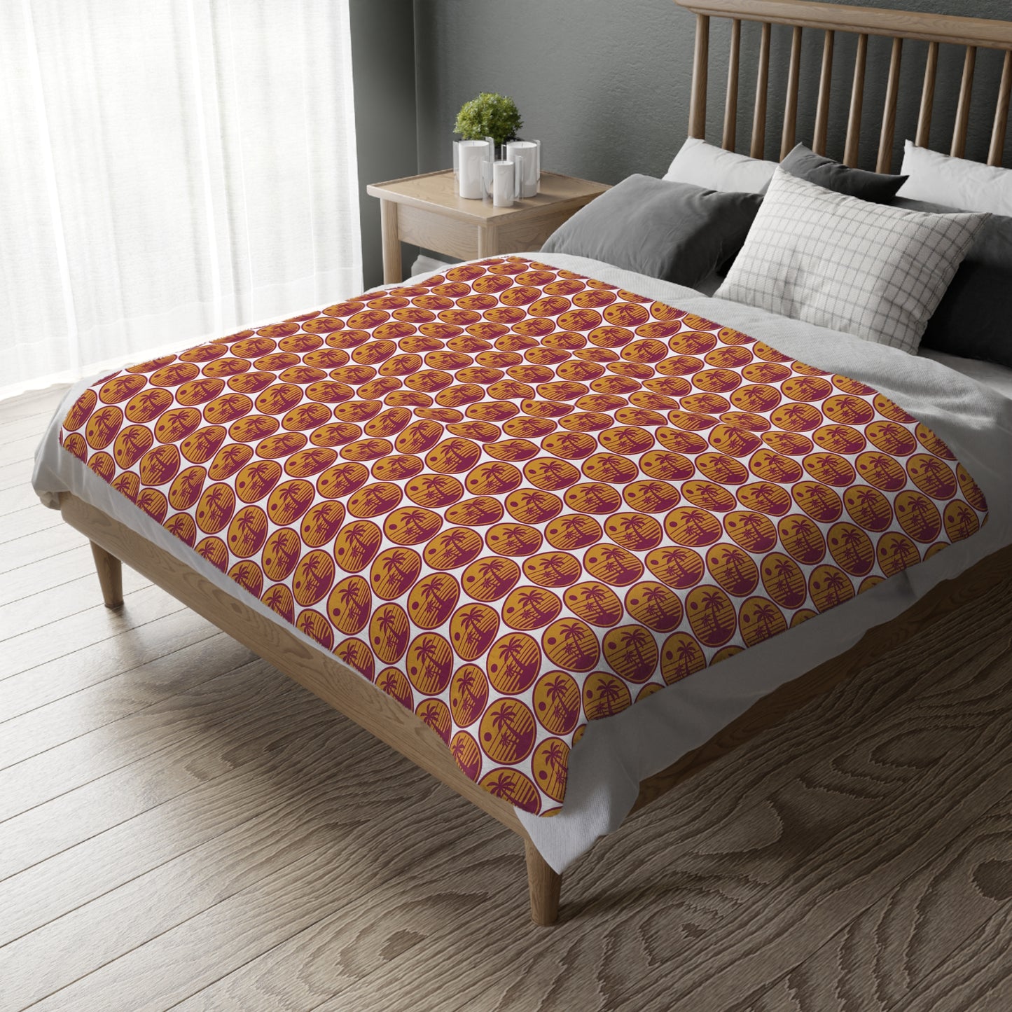 Velveteen throw blanket with repeating orange pumpkin circle print