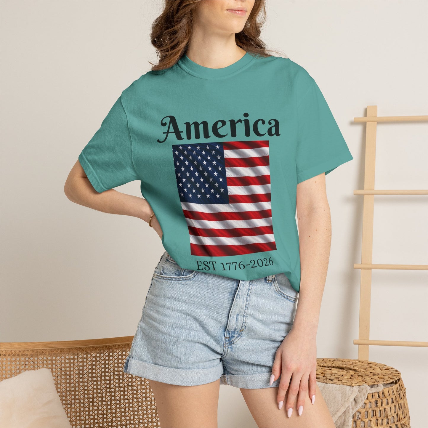 Teal T-shirt with front America script and U.S. flag graphic