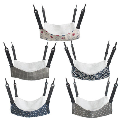 Set of pet hammocks with different prints and black hanging straps