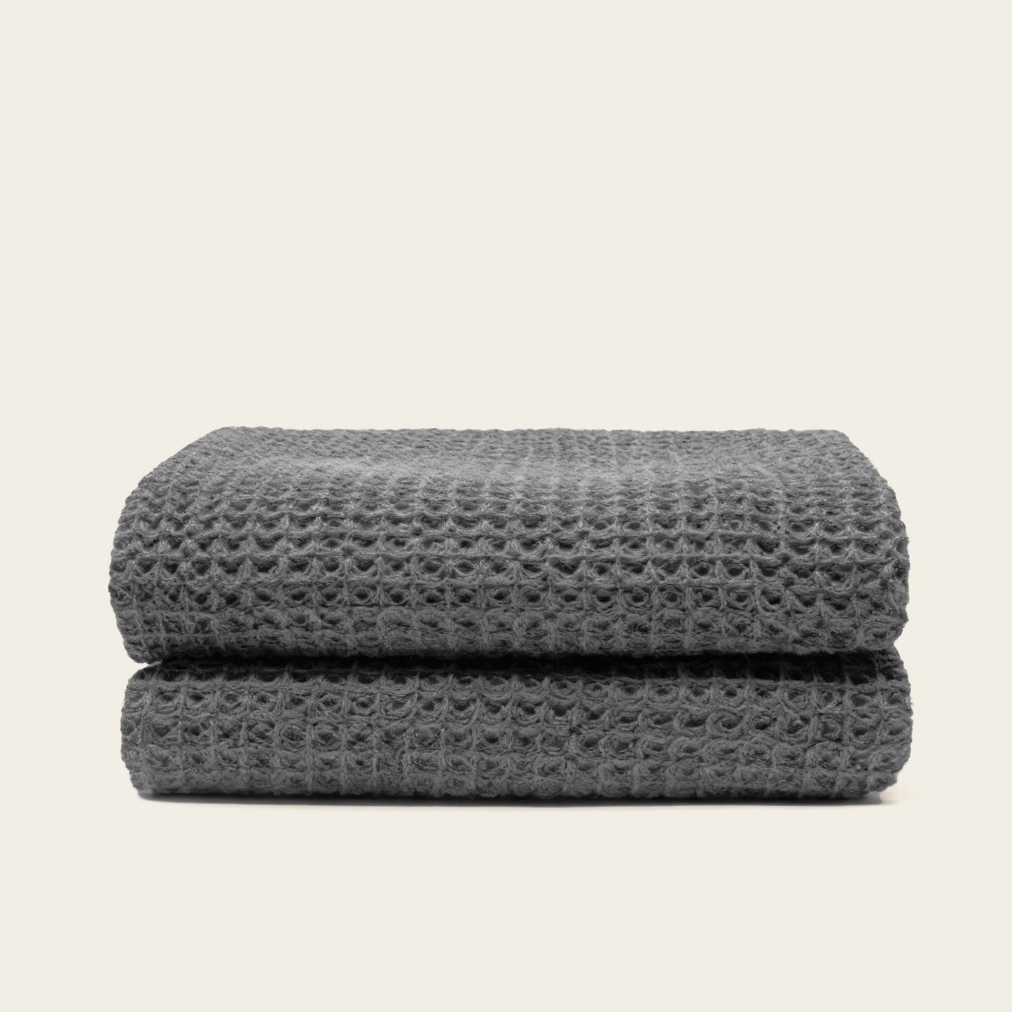 Australian cotton waffle towels in charcoal, neatly folded