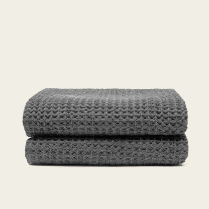 Australian cotton waffle towels in charcoal, neatly folded