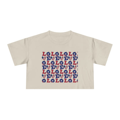 Ecru graphic crop tee with multicolor “LOL” block print
