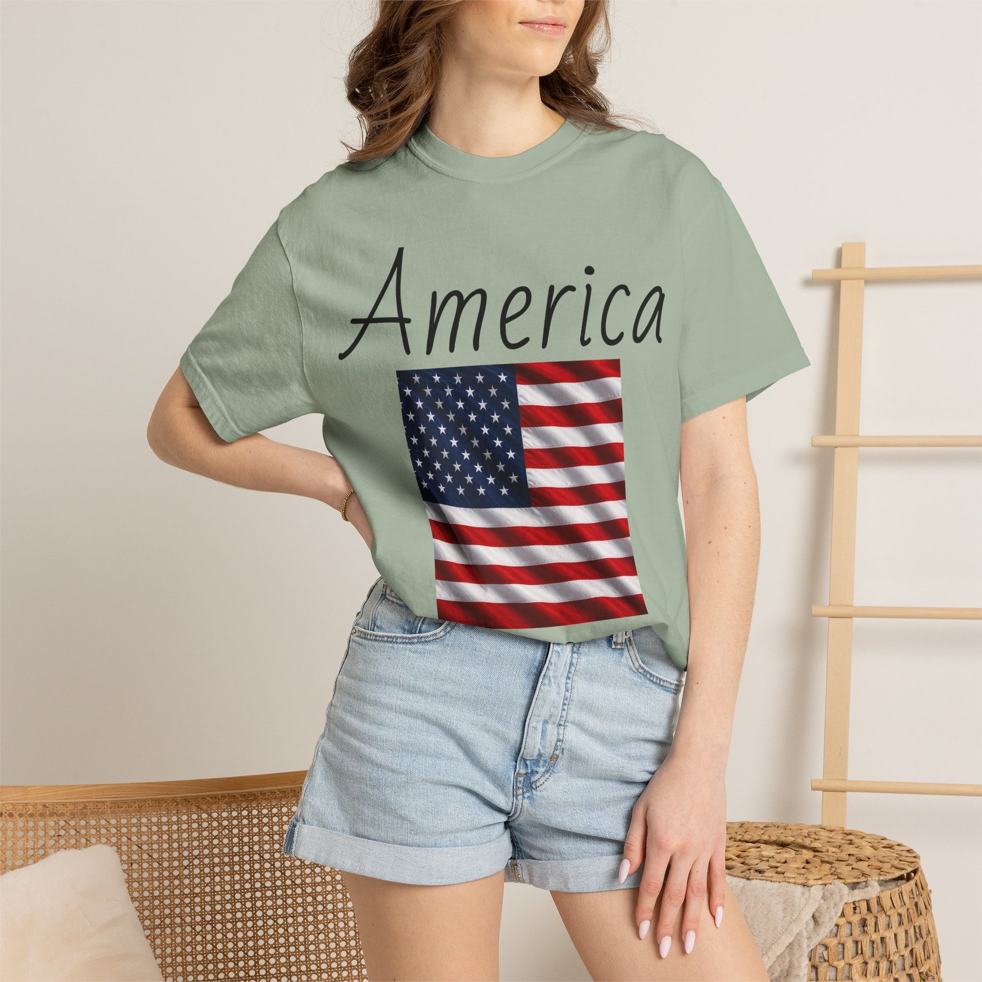 Unisex graphic T-shirt, sage green with “America” script and U.S. flag print