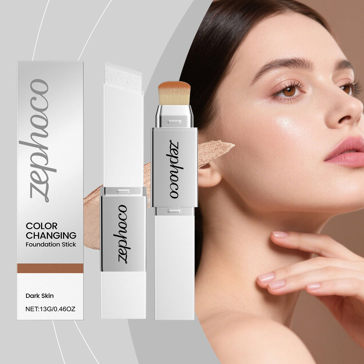 Color-changing foundation stick with brush tip next to boxed packaging on model