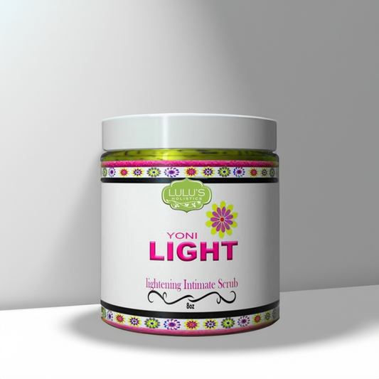 Body scrub jar with white lid, colorful floral band, and YONI LIGHT label front.