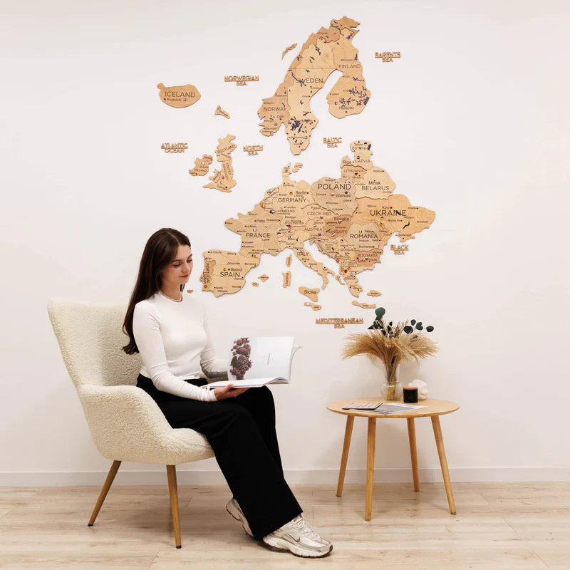 3D Europe wooden map with raised country outlines and city labels
