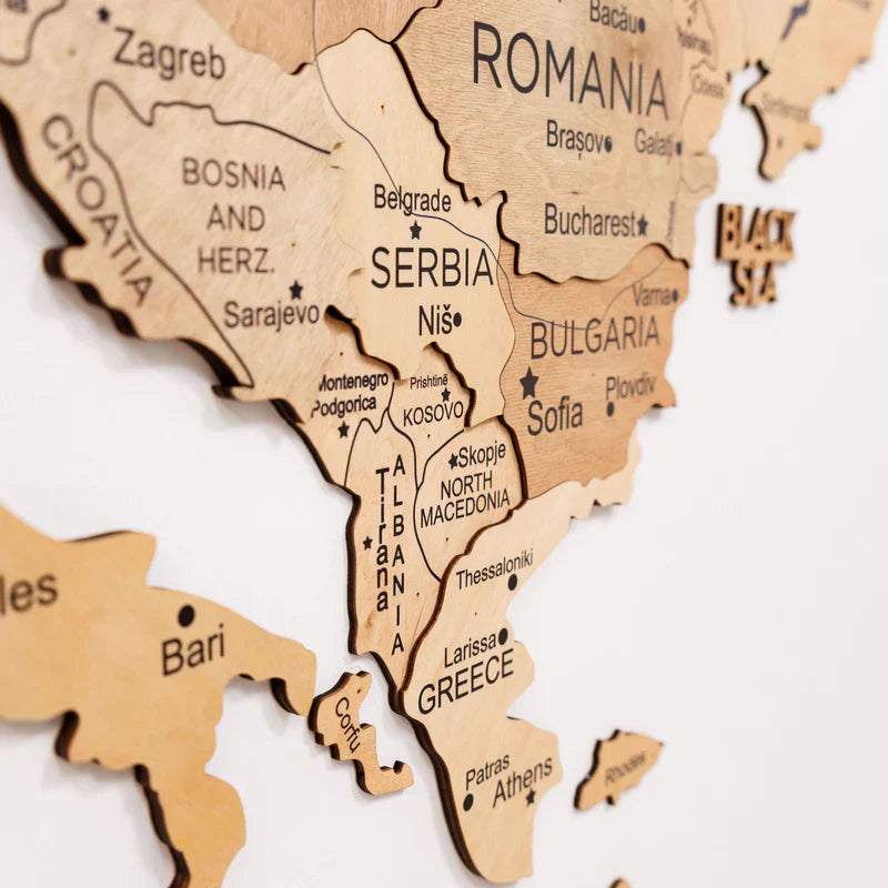 3D Europe wooden map detail showing Romania, Serbia, Bulgaria, and Greece
