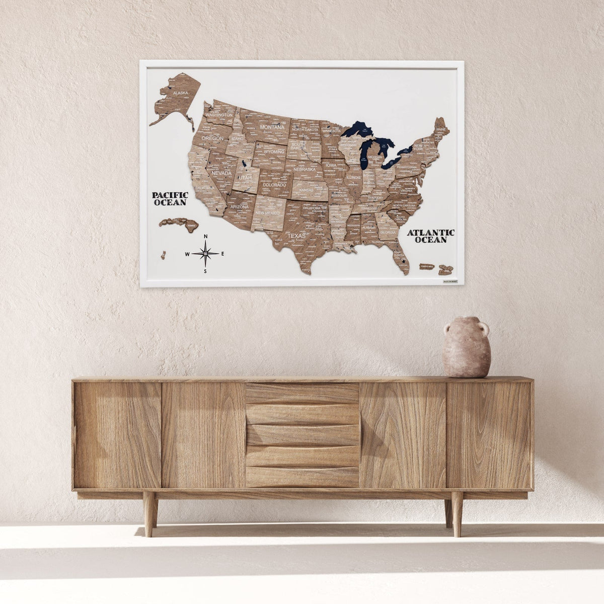 3D wooden USA map wall art mounted on wall with Pacific and Atlantic ocean labels