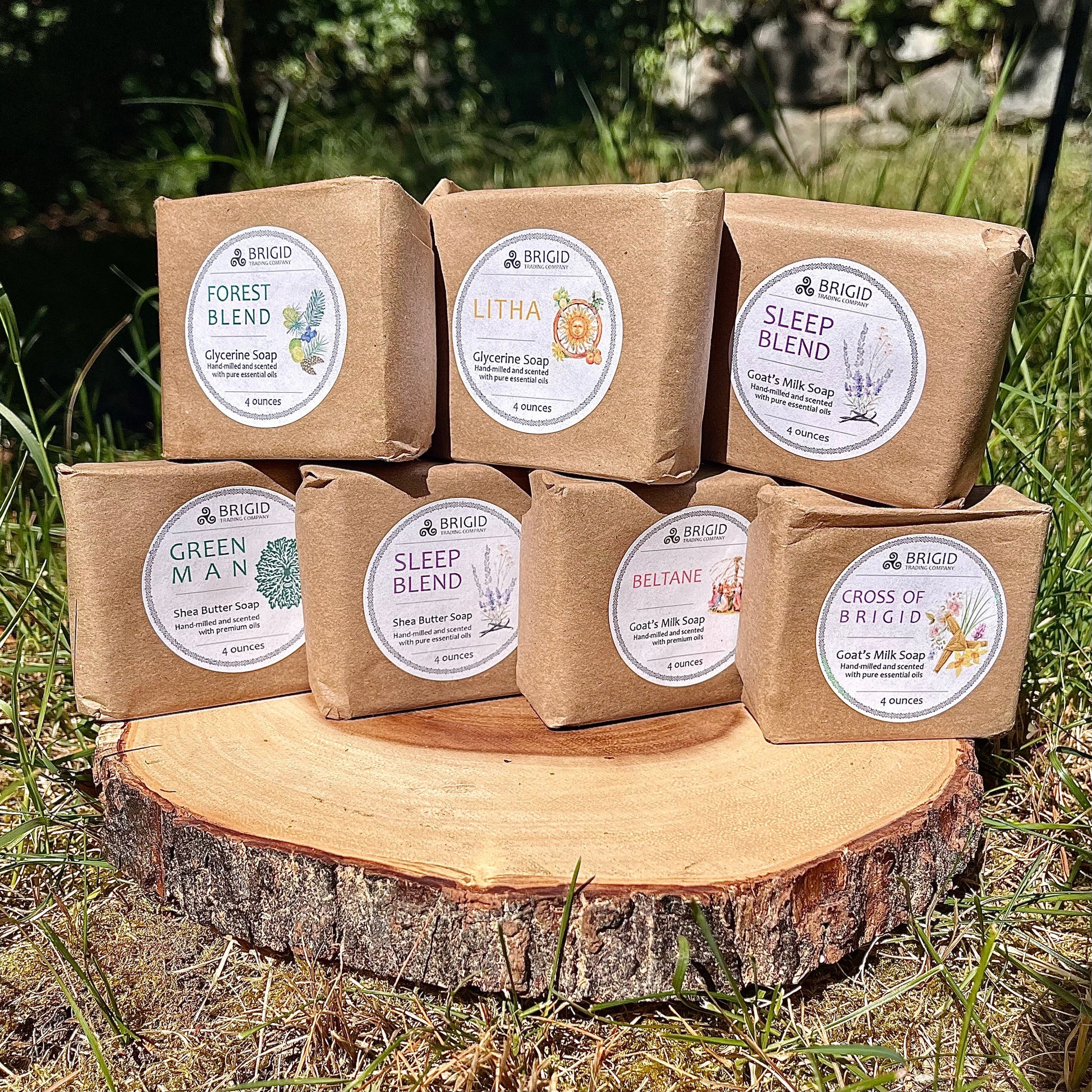 Assorted Brigid soap bars in kraft paper, each labeled and marked 4 ounces.