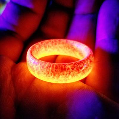 Glowing two-tone orange and red luminous unisex ring with textured surface