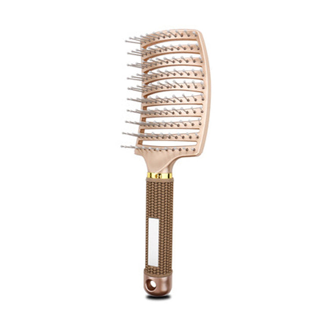 Beige massage hair comb with pin tips and tan textured handle