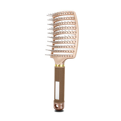 Beige massage hair comb with pin tips and tan textured handle