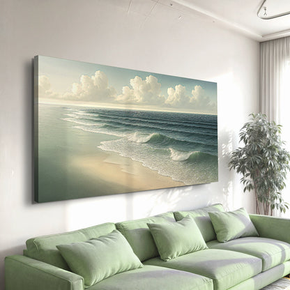 Beach shoreline canvas wall art with surf waves rolling onto sand and cloudy sky