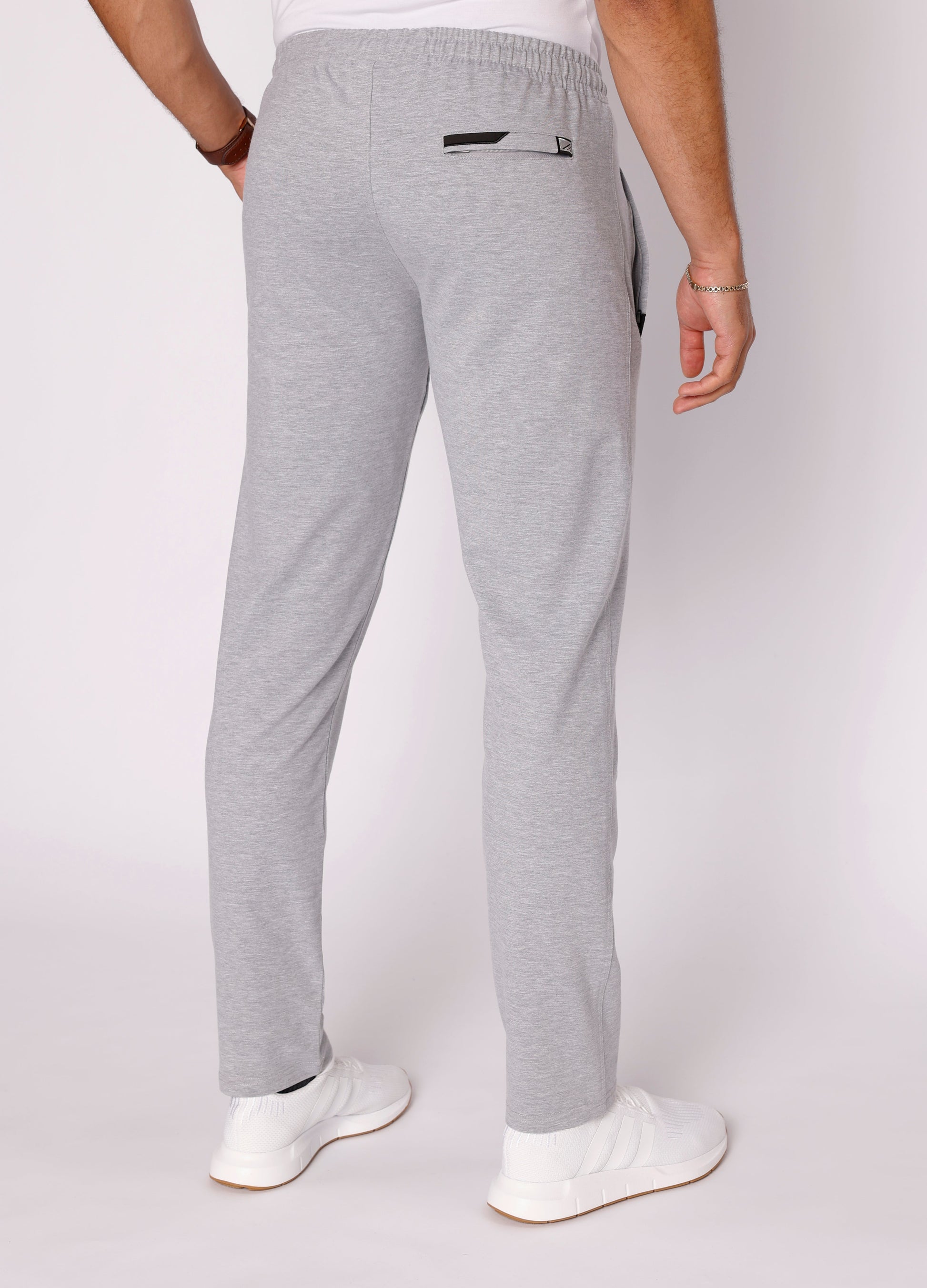 Light gray athletic sweatpants with tapered legs and elastic waistband