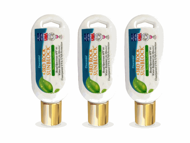 Sunscreen multipack with three white bottles and gold caps