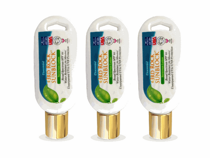 Sunscreen multipack with three white bottles and gold caps