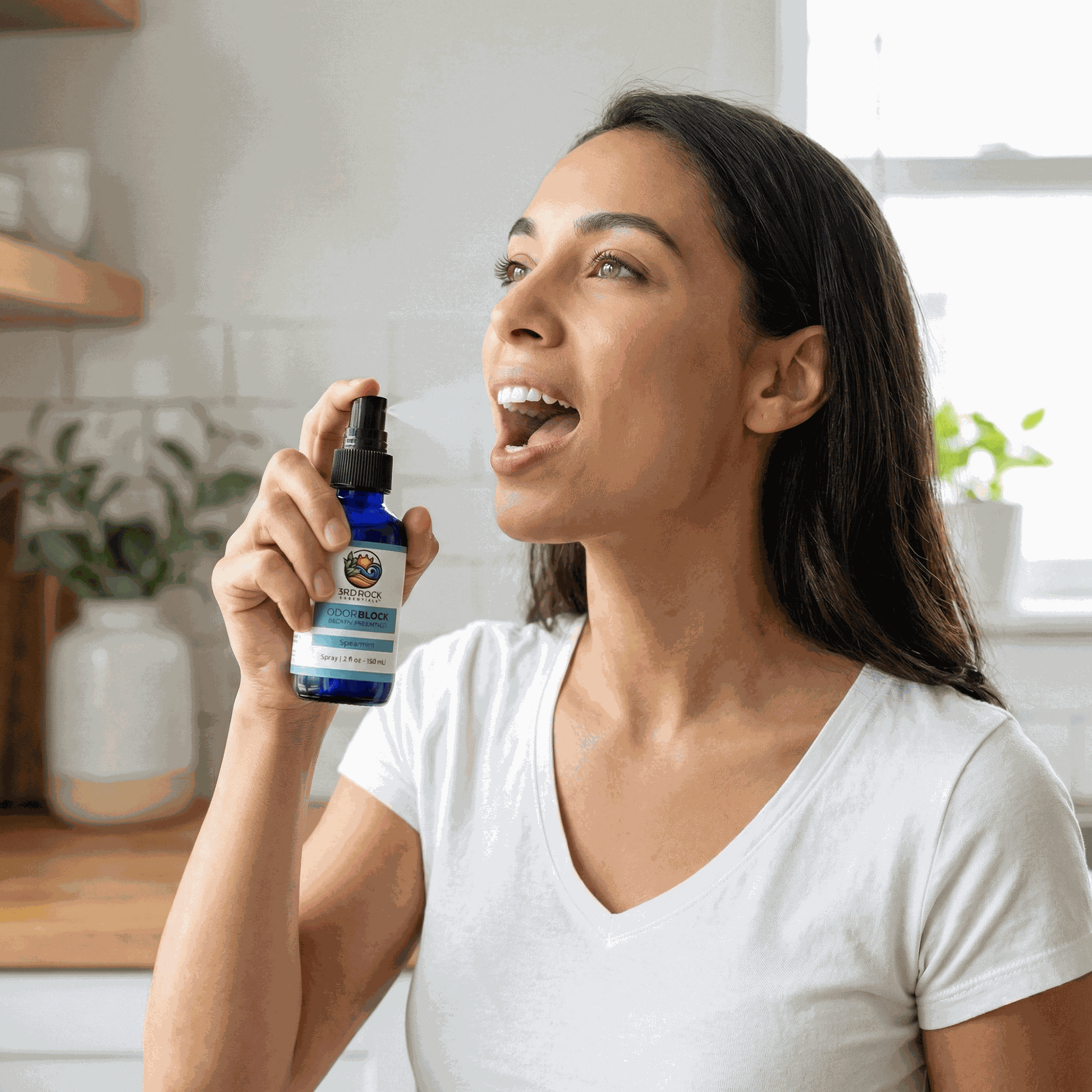 Breath freshener spray in hand, black mist nozzle aimed near the mouth