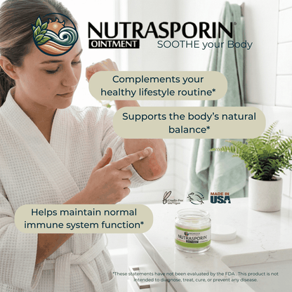 Nutrasporin ointment jar on bathroom counter while a woman applies ointment to her arm