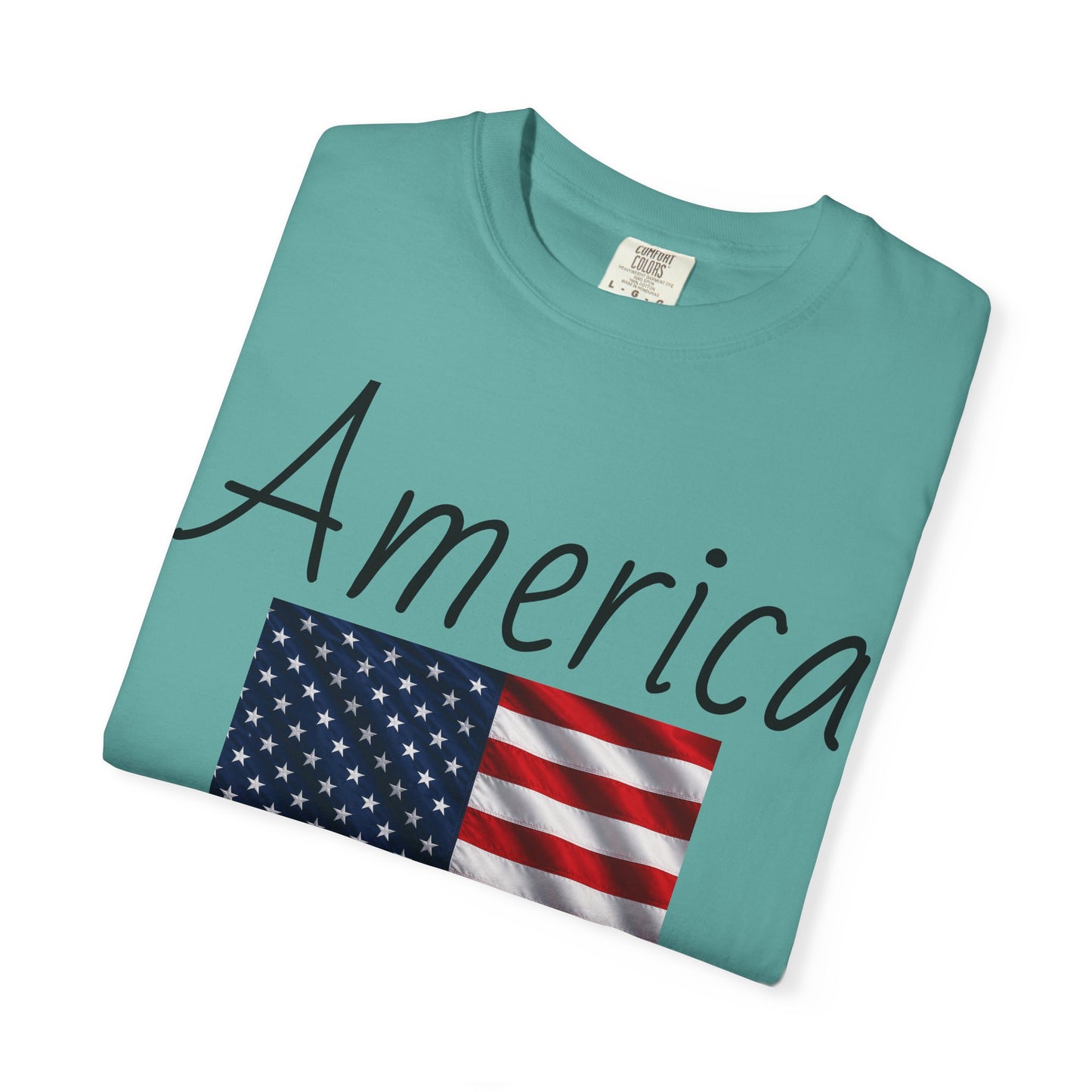 Angled teal unisex T-shirt with America script and U.S. flag graphic