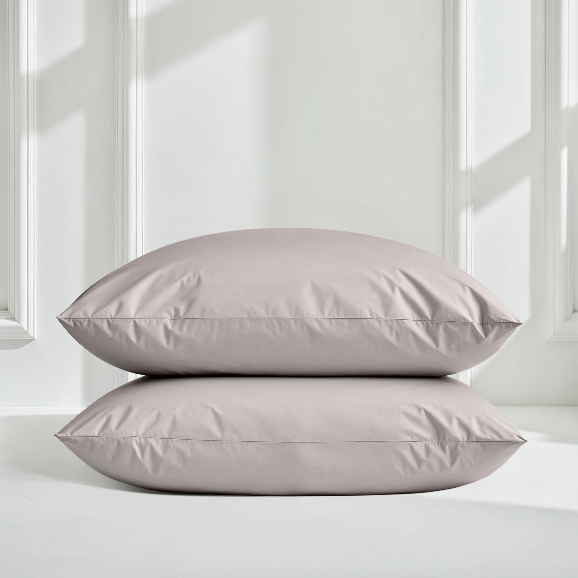 Lavender sateen bedding bundle with two pillows stacked